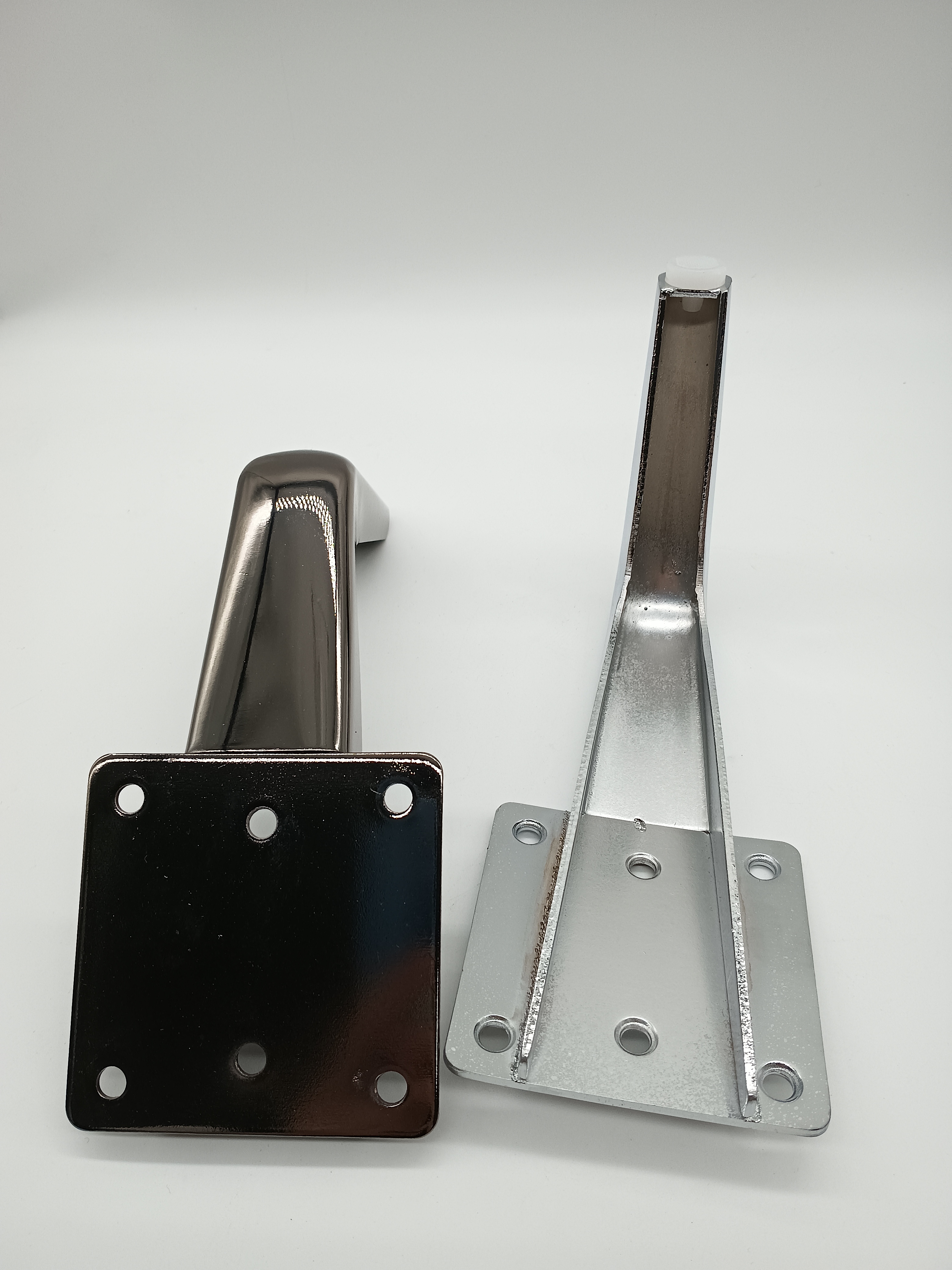Different surface finishes applied to metal furniture legs